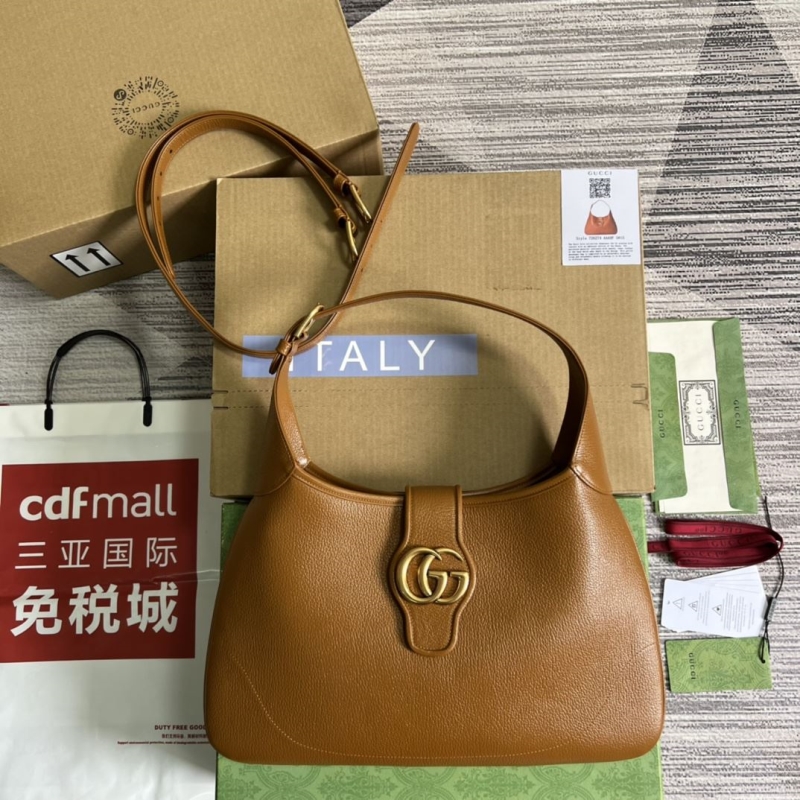 G*u*i top handle bags